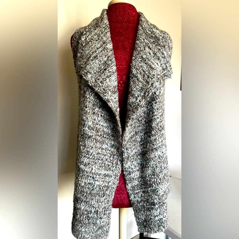 Elevated casual style with this sleeveless sweater vest
